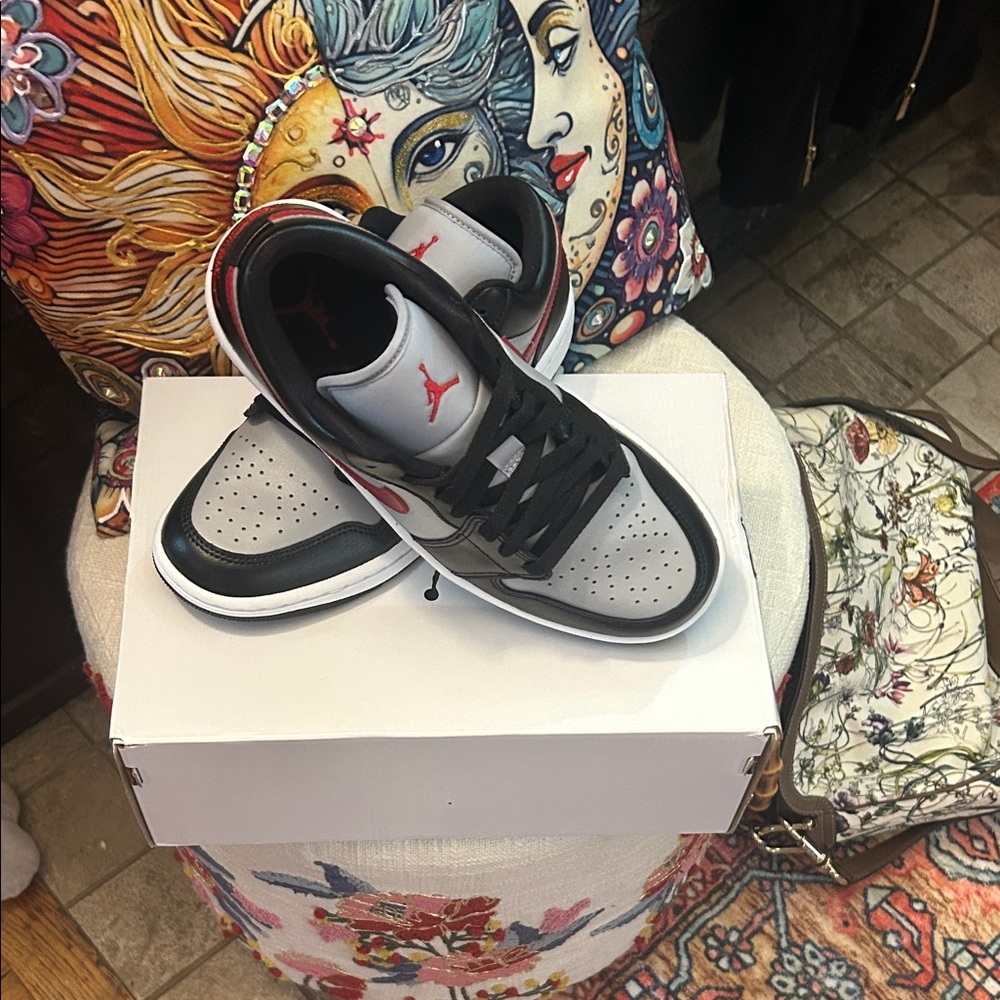 Jordan woman's  Black and Gray Sneakers with Red Accents
